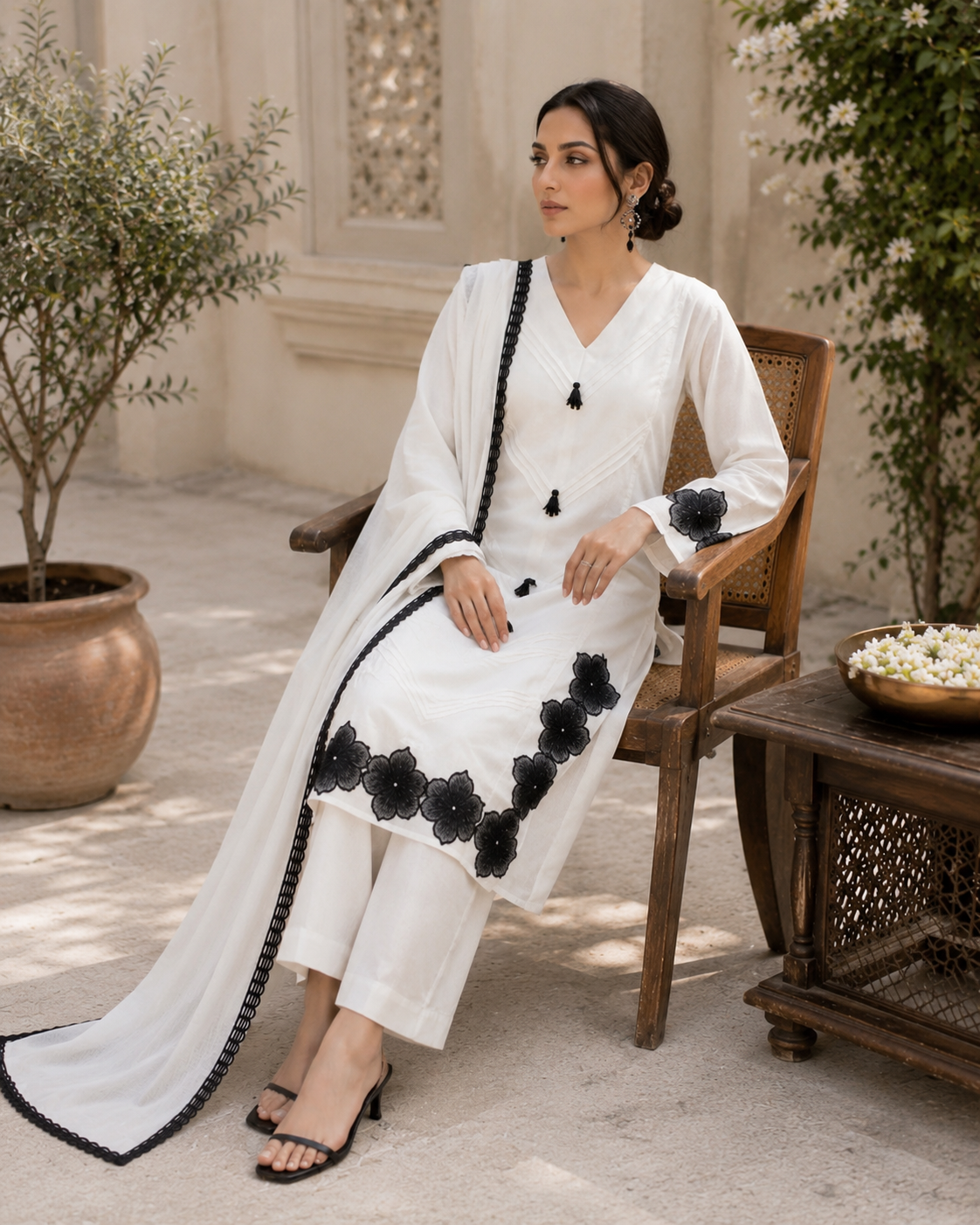 White eplic Pakistani kurta set - seated
